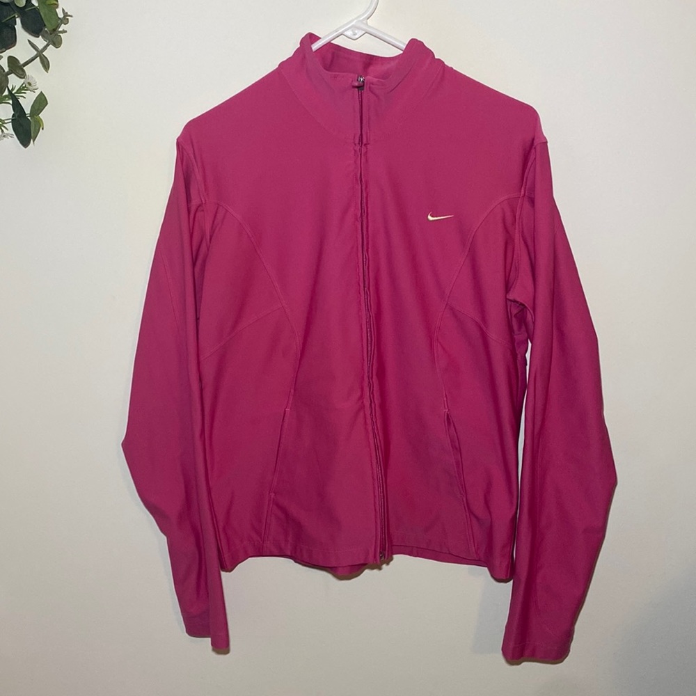Women’s pink Large 12-14 Nike full zipper jacket.